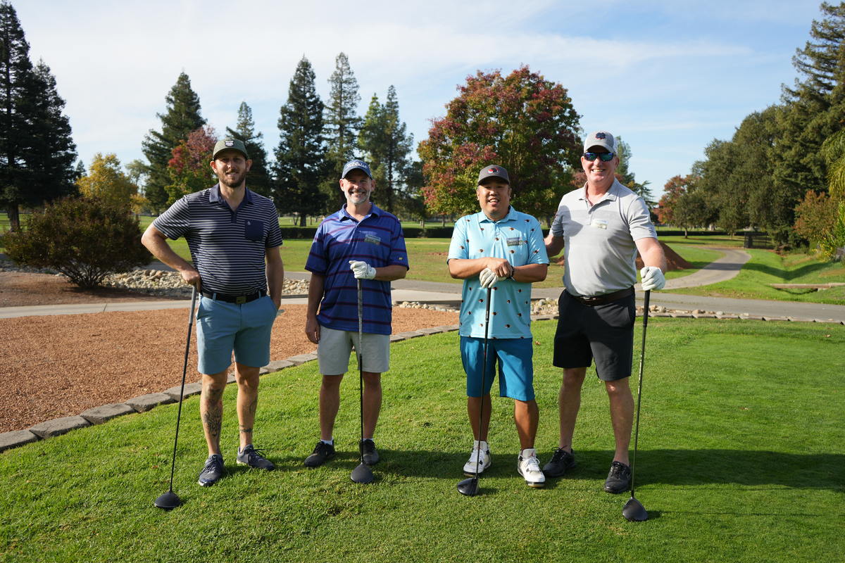 Four veterans gathered on the tee box
